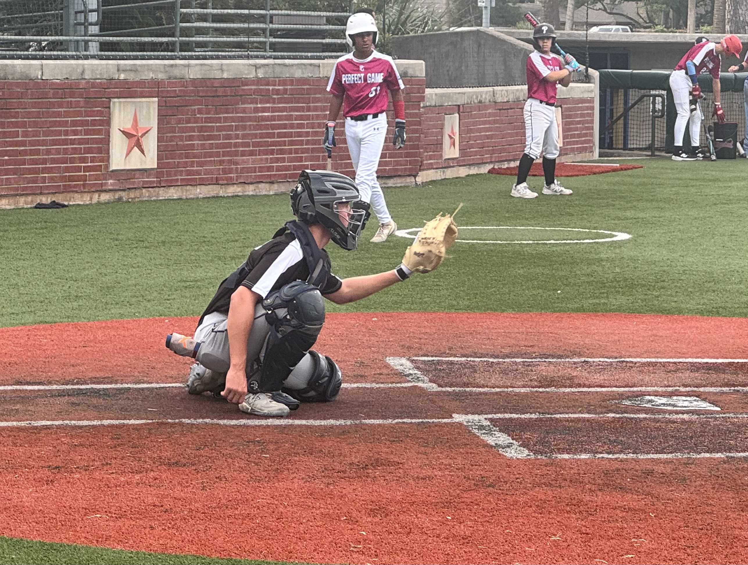 Carter Adkins behind the plate catching